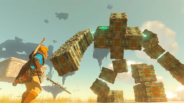 Link from the Zelda series faces off against a giant stone monster.